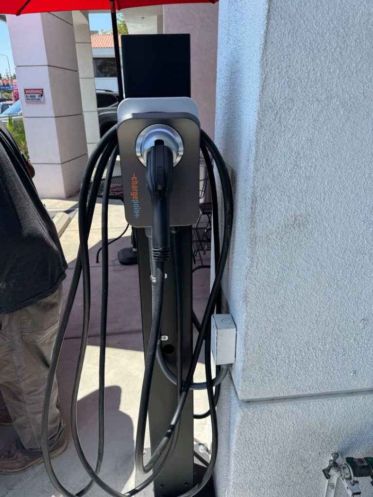 ChargePoint pedestal EV charger installed at a commercial property